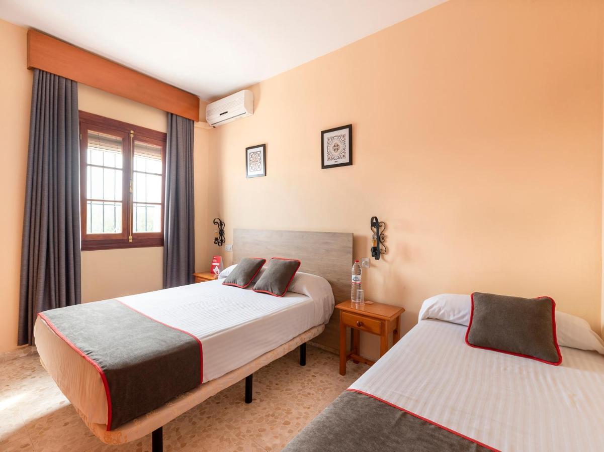 Oyo Hostal El Paisano Utrera Bagian luar foto